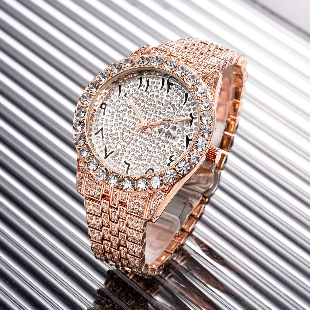 Rose gold watch with diamond-studded face on a metallic background